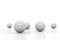 Five white reflective spheres blending into a bright white environment
