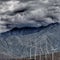 Five wind power windmills in the California desert.