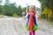 Five-year-old girl inflates soap bubbles