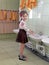 The five-year-old girl washes hands in the wash basin of kindergarten