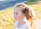 Five years old caucasian child girl standing by the road