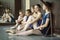 Five young dancers in the same dance costumes, resting sitting o