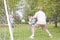 Five young friends playing soccer