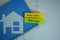 Fixed-Rate Mortgage write on sticky notes isolated on Wooden Table