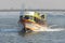 Fixed-route passenger boat `Speed boat` Chao Phraya river. Bangkok,Thailand