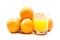 Fizzy orange juice from effervescent tablet with oranges at backdrop