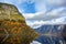 Fjord and Mountains in the autumn season that reflect the water in Norway