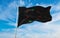 flag of African Americans of Naval jack of the Confederate at cloudy sky background on sunset, panoramic view.. copy space for