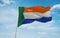 flag of Africans of European ancestry Afrikaners at cloudy sky background, panoramic view.flag representing ethnic group or