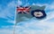 flag of Air Force Ensign of the United Kingdom at cloudy sky background on sunset, panoramic view. united kingdom of great