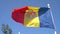 Flag Andorra fluttering against blue sky in slow motion