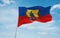 flag of Anglo-Frisian peoples Wangerooge Frisians at cloudy sky background, panoramic view.flag representing ethnic group or