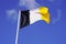 Flag of Arcachon town southwest waving in the air on blue sky in France