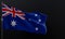 Flag Australia. Fabric flag Australia on the black background. Copy spaceâ€¤ 3D work and 3D illustration