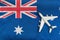 Flag of Australia and model airplane. Flights to Australia after quarantine. Mesatlantica flights