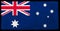 Flag of Australia on the old grunge postage stamp isolated on black background