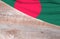 Flag Bangladesh and space for text on a wooden background