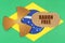 On the flag of Brazil, the symbol of radioactivity and torn cardboard with the inscription - RADON FREE