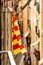 Flag of Catalonia hanging in the balcony in residential area, urban background