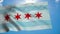 Flag of Chicago city waving in the wind against deep beautiful blue sky