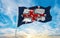 flag of Coronation Standard of Australia 1911 , Australia at cloudy sky background on sunset, panoramic view. Australian travel