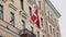 the flag of Denmark on the facade of the building