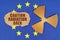 On the flag of the EU, the symbol of radioactivity and torn cardboard with the inscription - caution radiation area