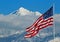 Flag Flies Above Snowy Utah Mountain
