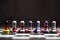 Flag of G7 countries print screen on pawn chess with black background. G7 are includes USA Germany Japan Canada France England and