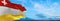 flag of German peoples Alemannic-speaking Germans at cloudy sky background, panoramic view. flag representing ethnic group or