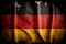 Flag of Germany background with a distressed vintage weathered effect texture