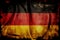 Flag of Germany background with a distressed vintage weathered effect texture