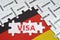 On the flag of Germany there are puzzles with the names of cities and puzzles with the inscription - Visa