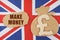 On the flag of Great Britain, a bag with a money symbol and a cardboard with the inscription - MAKE MONEY