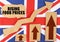 On the flag of Great Britain, a growth chart and a cardboard plate with the inscription - Rising food prices