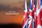Flag of Great Britain with Text on background of sunset. Holidays of the UK.