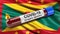 Flag of Grenada waving in the wind with a positive Covid-19 blood test tube. 3D illustration concept.