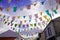 Flag hanging in the streets for the passage of the tour de France cycling race with the symbols of the different shirt of the best