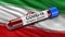 Flag of Iran waving in the wind with a positive Covid-19 blood test tube. 3D illustration concept for blood testing.