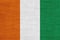 Flag of Ivory Coast on old linen