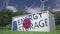 Flag of Japan and ENERGY STORAGE text on a battery container at wind turbines, 3d rendering