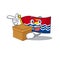 Flag kiribati Scroll cartoon character bringing a box