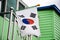 Flag of Korea or korean nation on steel pole at outdoor of house home at Gamcheon Culture Village or Santorini of Pusan city in