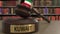 Flag of Kuwait on judges gavel in court. National justice or jurisdiction related conceptual 3D rendering