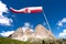 Flag Ladin abreast of Sella in Val Gardena with the Sella Group