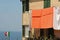 Flag and laundry hung on to dry, Corniglia.