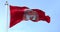 The flag of Liverpool Football Club waving in the wind on a clear day