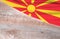 Flag Macedonia and space for text on a wooden background