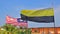Flag of Malaysia waving in the air together with flag of Perak State in the foreground