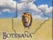 Flag Map of Botswana on which is a picture of a lion. There is the text of Botswana. There is It is national african background.